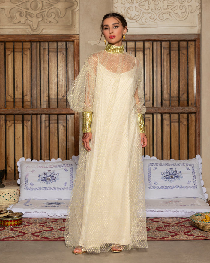 Gold koufeya print tulle dress with high trimmed collar and fitted sleeves with inner dress