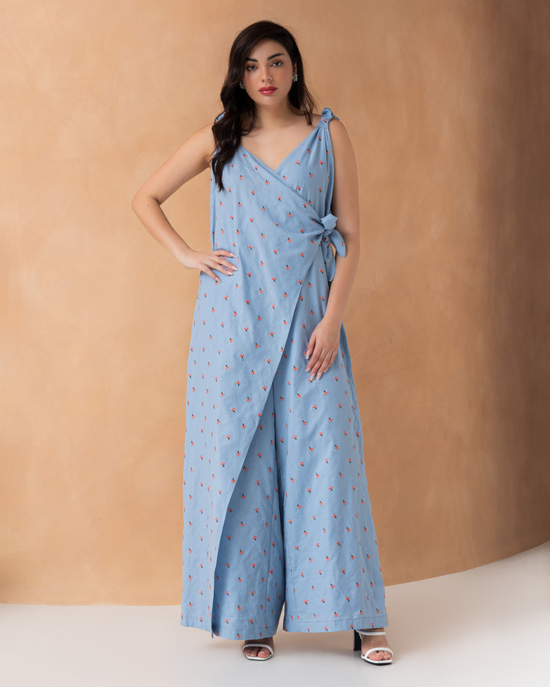 Sleeveless overlapped cotton jumpsuit with mini embroidered flowers