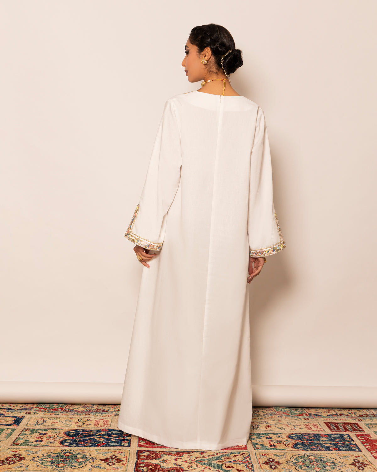 Linen kaftan with unsymmetrical embellished trimmed neckline