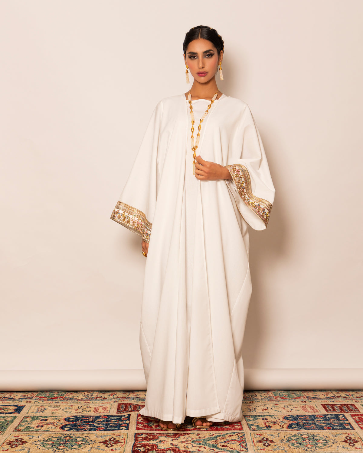 Classic linen abaya with embellished trimmings on sleeves