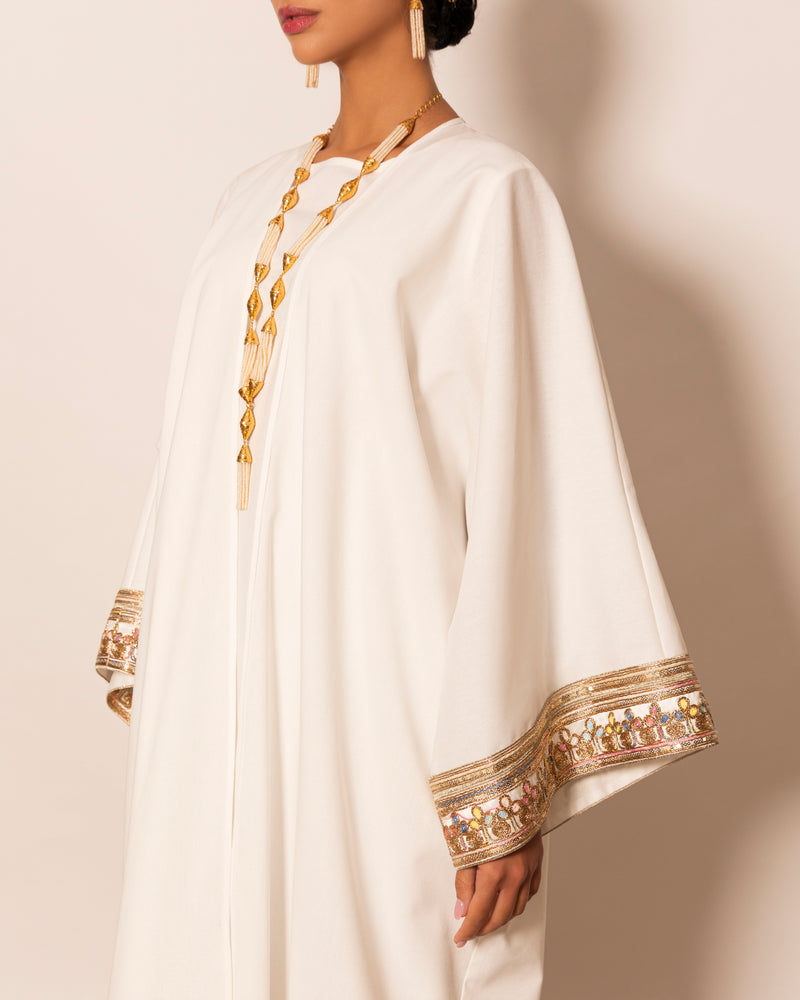 Classic linen abaya with embellished trimmings on sleeves