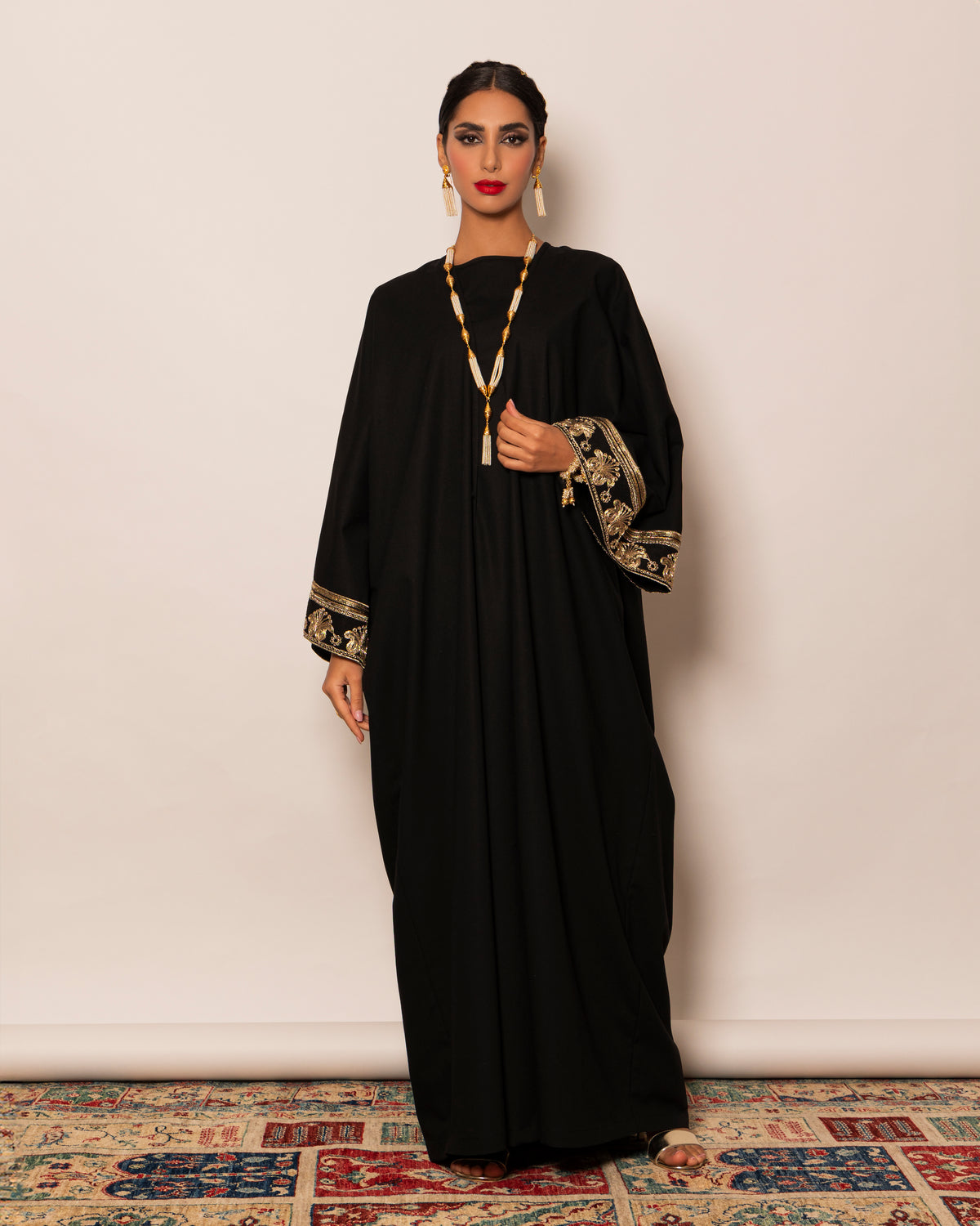 Classic linen abaya with embellished trimmings on sleeves