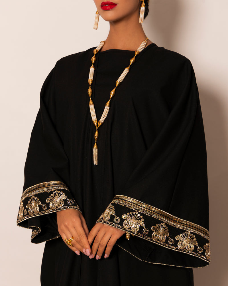 Classic linen abaya with embellished trimmings on sleeves