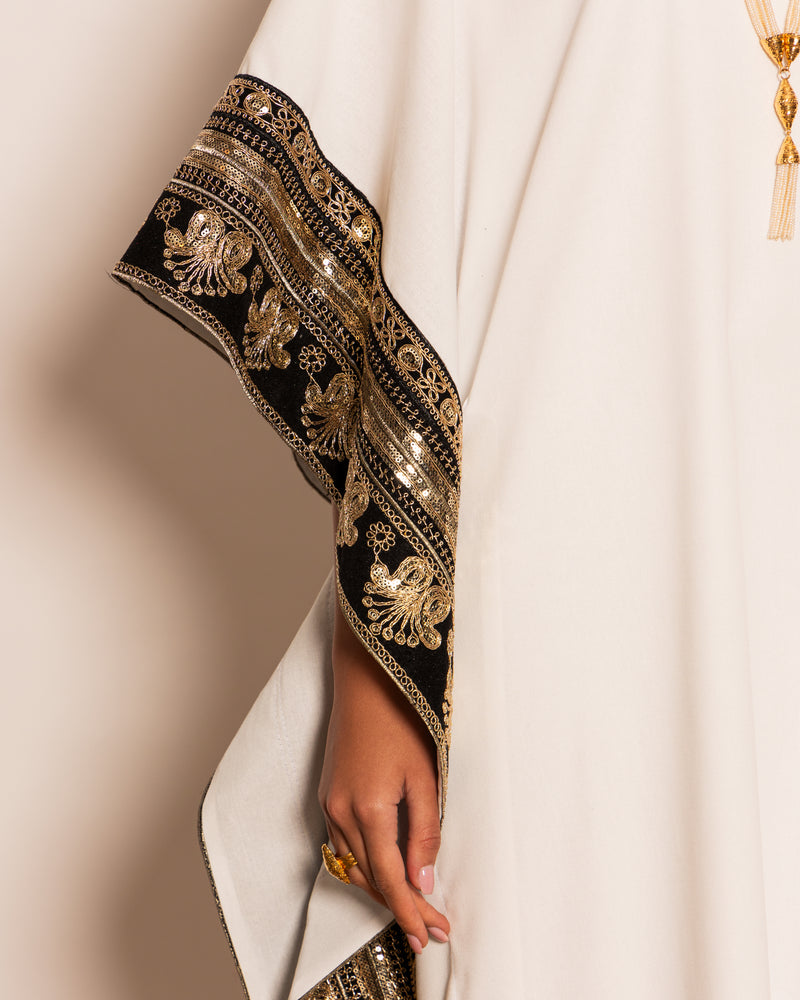 Double sided trimmed linen kaftan with inner stitching