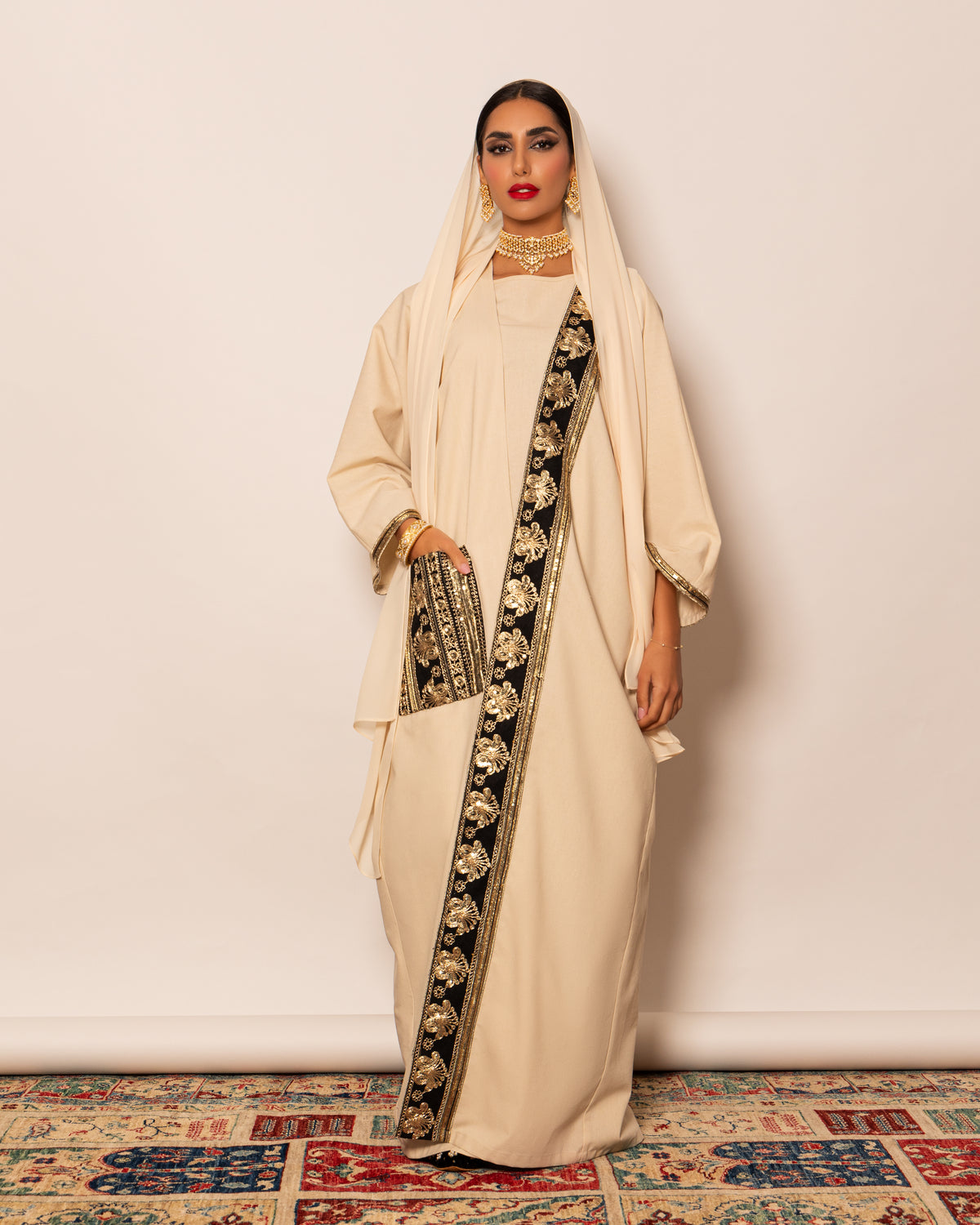 Classic linen abaya with embellished trimmings on pocket, sleeves & hemline