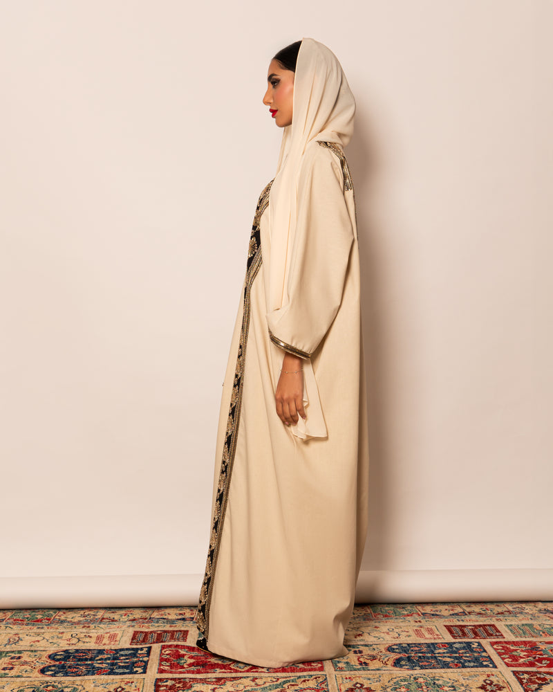 Classic linen abaya with embellished trimmings on pocket, sleeves & hemline