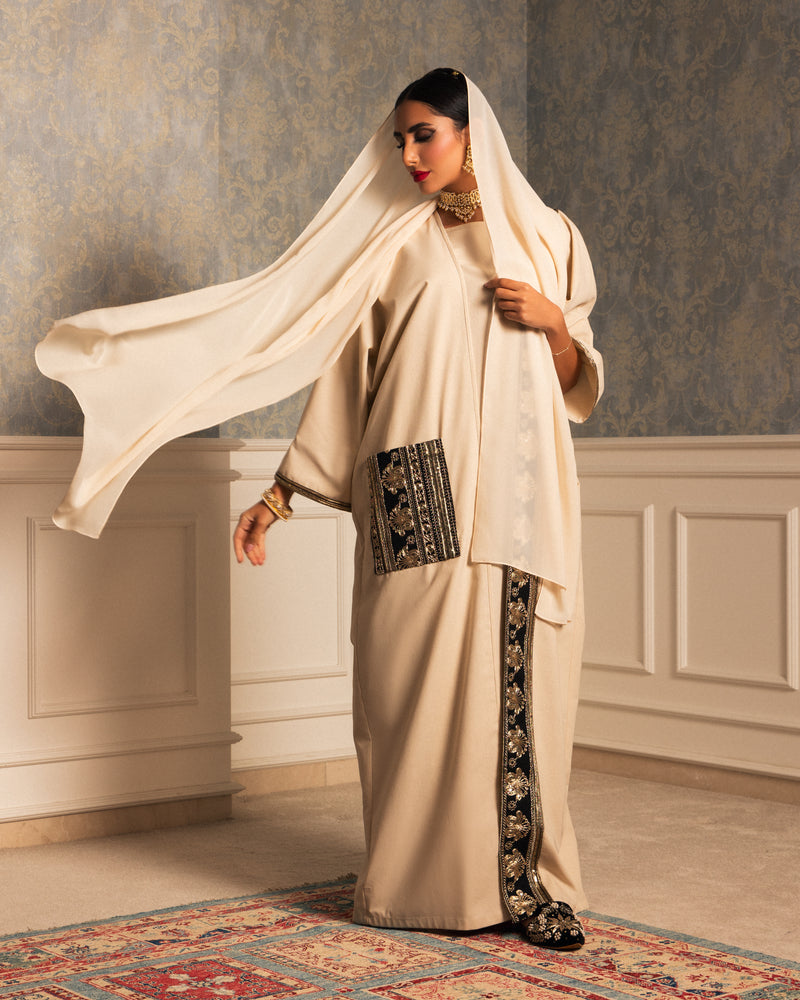 Classic linen abaya with embellished trimmings on pocket, sleeves & hemline