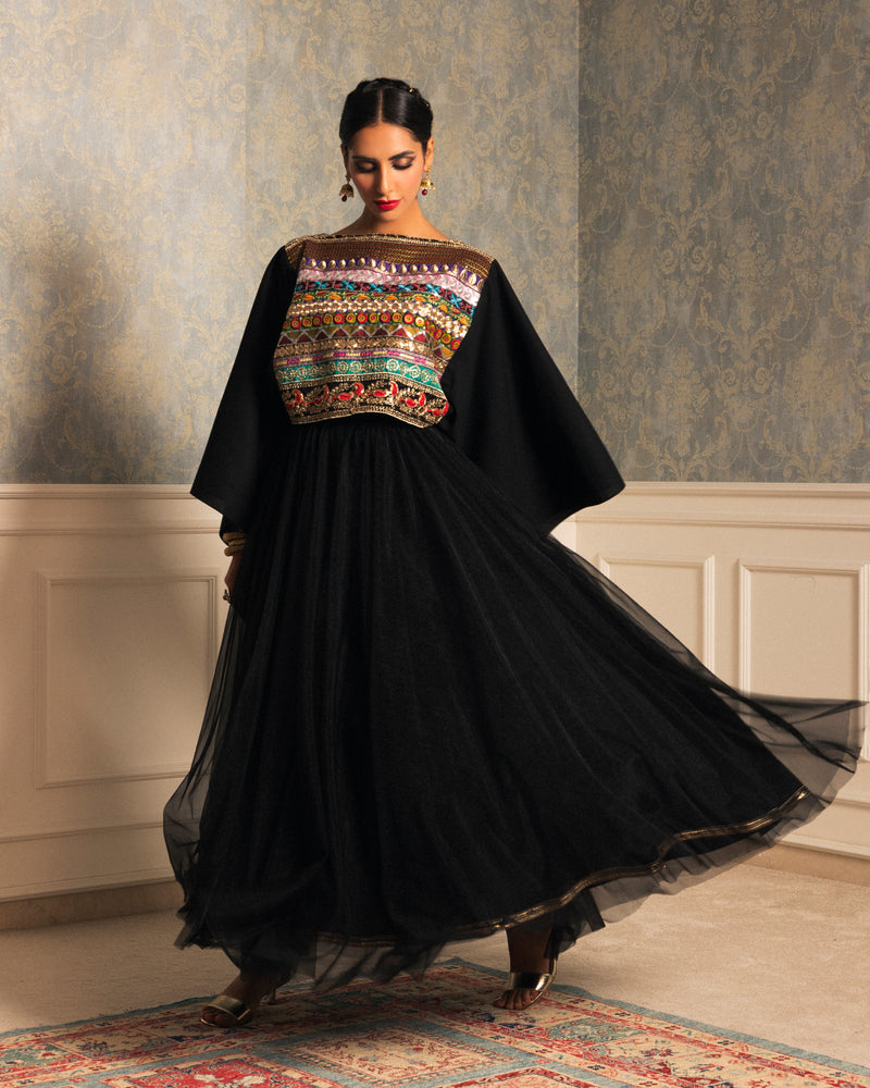 Poncho style top in linen with embellished centered trimming & shiny tulle skirt with trimmed hemline