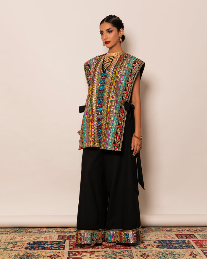 Fully embellished trimmed waistcoat with wide legged pants with embellished trim hemline