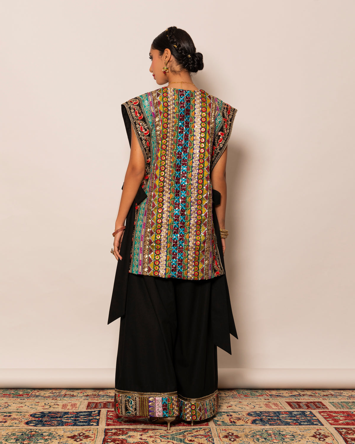 Fully embellished trimmed waistcoat with wide legged pants with embellished trim hemline