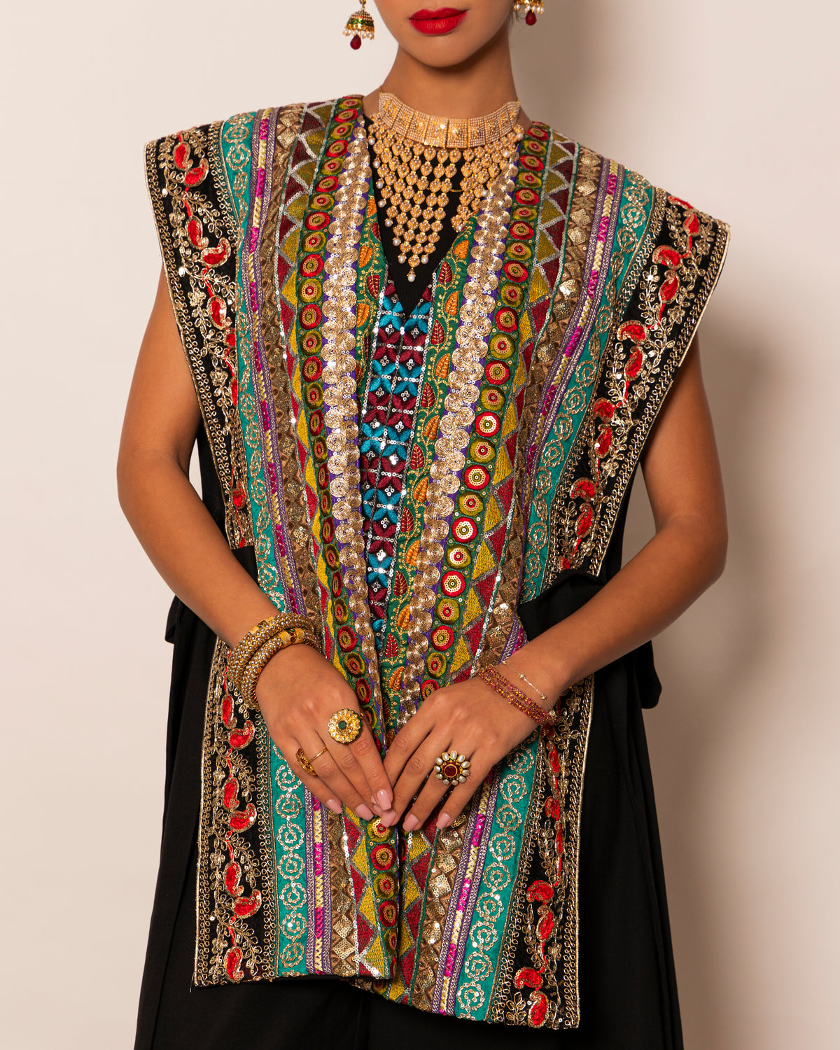 Fully embellished trimmed waistcoat with wide legged pants with embellished trim hemline