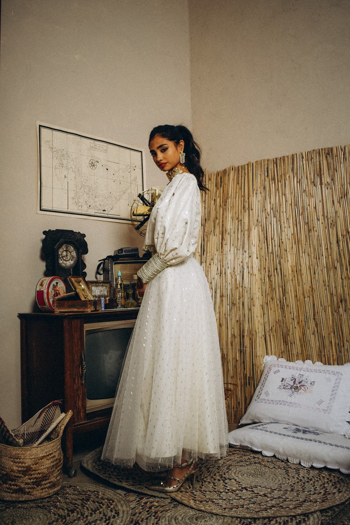 Metallic gold jacquard ensemble top with trimmings on cuff. Skirt is dotted cream tulle & lined with tafetta